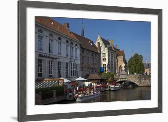 Tourists in boats travel on the Den Dijver canal in summer, Bruges, West Flanders, Belgium, Europe-Peter Barritt-Framed Photographic Print