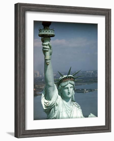 Tourists Looking Out from the Statue of Liberty Crown-Ralph Morse-Framed Photographic Print
