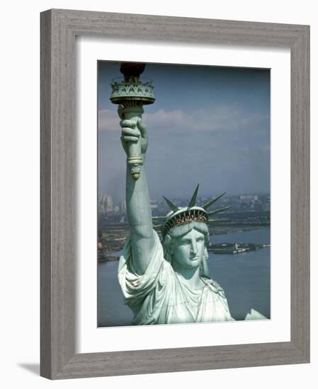 Tourists Looking Out from the Statue of Liberty Crown-Ralph Morse-Framed Photographic Print