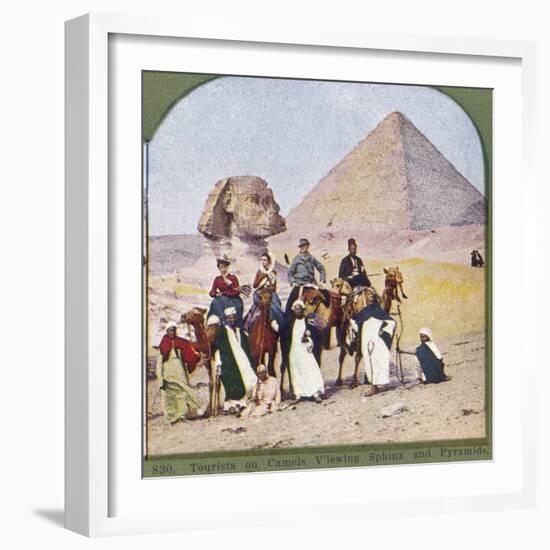 Tourists on Camels at Gizeh, the Sphinx and a Pyramid Behind Them-null-Framed Photographic Print