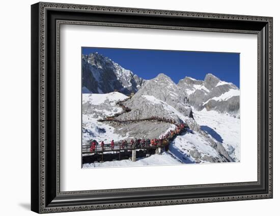 Tourists on Jade Dragon Snow Mountain (Yulong Xueshan), Lijiang, Yunnan, China, Asia-Ian Trower-Framed Photographic Print