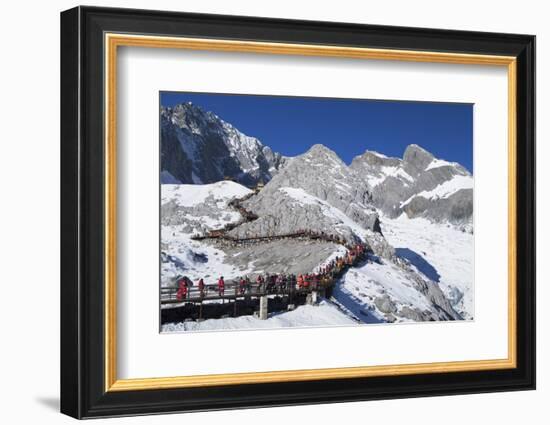Tourists on Jade Dragon Snow Mountain (Yulong Xueshan), Lijiang, Yunnan, China, Asia-Ian Trower-Framed Photographic Print