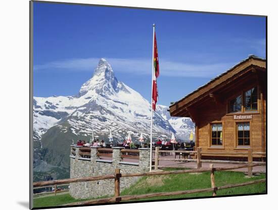 Tourists on the Balcony of the Restaurant at Sunnegga Looking at the Matterhorn in Switzerland-Rainford Roy-Mounted Photographic Print