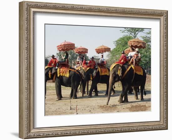 Tourists Riding Elephants in Traditional Royal Style, Ayuthaya, Thailand, Southeast Asia-Richard Nebesky-Framed Photographic Print