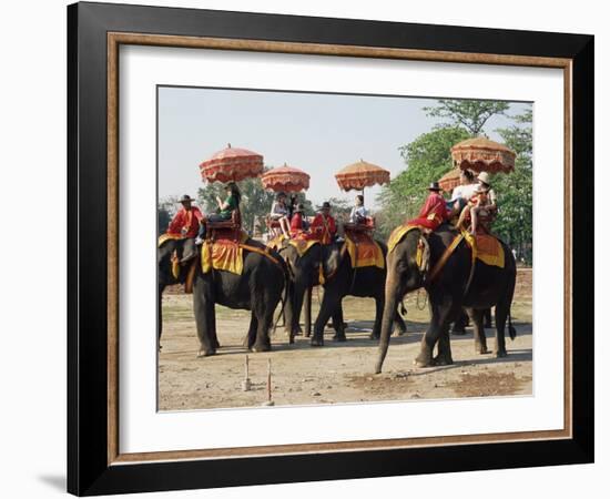 Tourists Riding Elephants in Traditional Royal Style, Ayuthaya, Thailand, Southeast Asia-Richard Nebesky-Framed Photographic Print