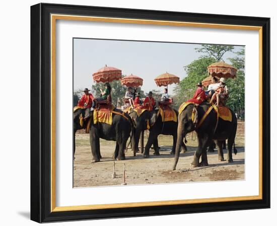 Tourists Riding Elephants in Traditional Royal Style, Ayuthaya, Thailand, Southeast Asia-Richard Nebesky-Framed Photographic Print