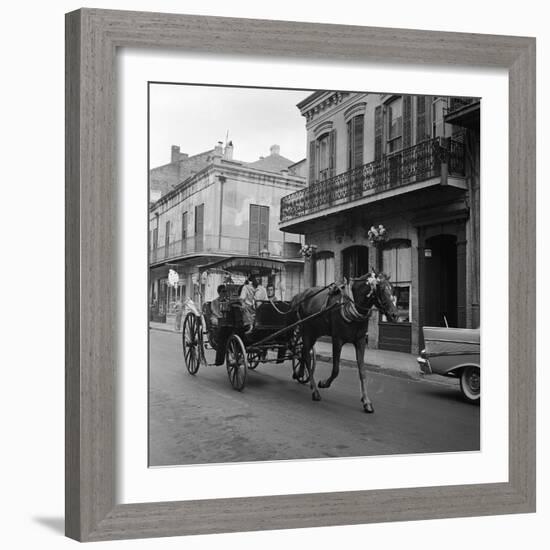 Tourists Take in the Scenery Via Horse-Drawn Carriage on Royal Street in New Orleans-null-Framed Photographic Print