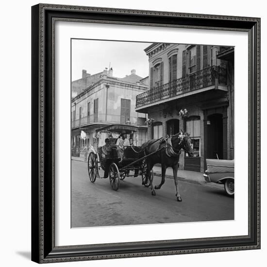 Tourists Take in the Scenery Via Horse-Drawn Carriage on Royal Street in New Orleans-null-Framed Photographic Print