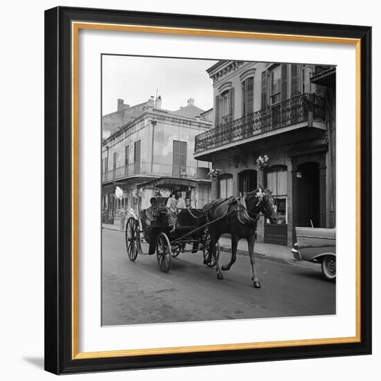 Tourists Take in the Scenery Via Horse-Drawn Carriage on Royal Street in New Orleans-null-Framed Photographic Print