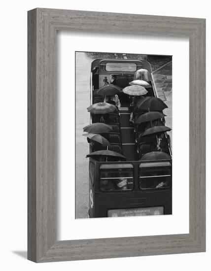 Tourists under Umbrellas on Open Top Bus, 1976-Kent Gavin-Framed Photographic Print