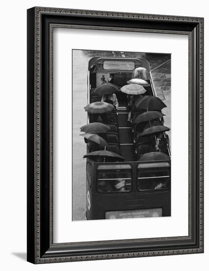 Tourists under Umbrellas on Open Top Bus, 1976-Kent Gavin-Framed Photographic Print