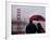 Tourists Use an Umbrella During a Light Rain, Looking at the Golden Gate Bridge in San Francisco-null-Framed Photographic Print