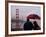 Tourists Use an Umbrella During a Light Rain, Looking at the Golden Gate Bridge in San Francisco-null-Framed Photographic Print