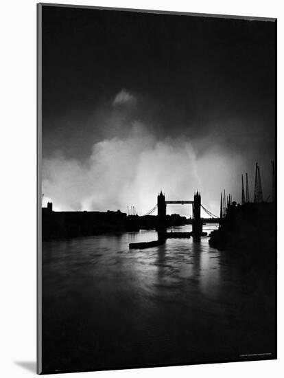 Tower Bridge Against Fires Burning on London's Docks, Ignited During German Air Raid Attack on City-William Vandivert-Mounted Photographic Print