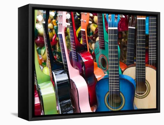 Toy Guitars, Olvera Street Market, El Pueblo de Los Angeles, Los Angeles, California, USA-Walter Bibikow-Framed Premier Image Canvas