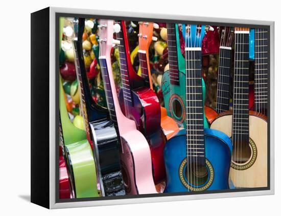 Toy Guitars, Olvera Street Market, El Pueblo de Los Angeles, Los Angeles, California, USA-Walter Bibikow-Framed Premier Image Canvas