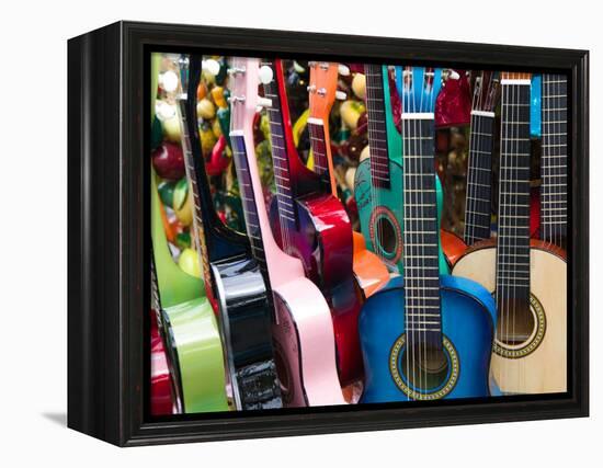 Toy Guitars, Olvera Street Market, El Pueblo de Los Angeles, Los Angeles, California, USA-Walter Bibikow-Framed Premier Image Canvas
