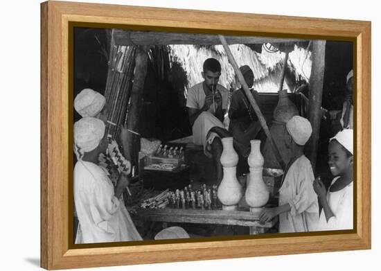 Toy Seller, Oman-null-Framed Premier Image Canvas