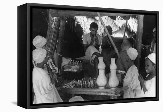 Toy Seller, Oman-null-Framed Premier Image Canvas
