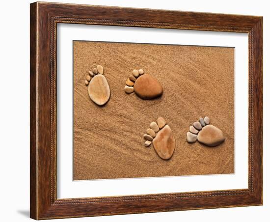 Trace Feet Steps Made Of A Pebble Stone On The Sea Sand Backdrop-Madlen-Framed Photographic Print