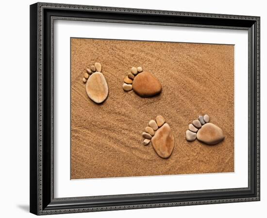 Trace Feet Steps Made Of A Pebble Stone On The Sea Sand Backdrop-Madlen-Framed Photographic Print