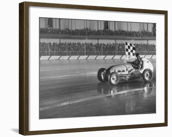 Track Record Holder Ted Tappett Circling Track With Checkered Flag After Winning-Ralph Morse-Framed Premium Photographic Print