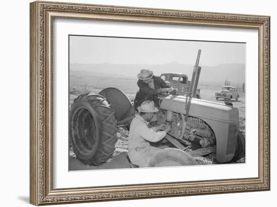 Tractor Repair: Driver Benji Iguchi, Mechanic Henry Hanawa, Manzanar Relocation Center, California-Ansel Adams-Framed Art Print