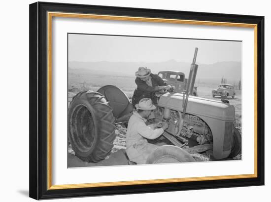 Tractor Repair: Driver Benji Iguchi, Mechanic Henry Hanawa, Manzanar Relocation Center, California-Ansel Adams-Framed Art Print