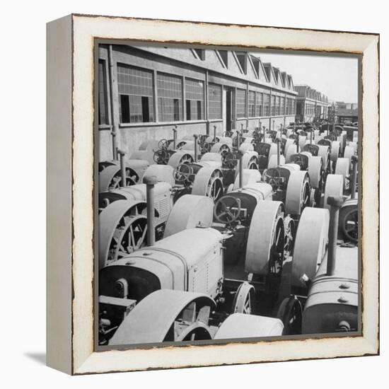 Tractors at Officine Meccaniche Company-Dmitri Kessel-Framed Premier Image Canvas