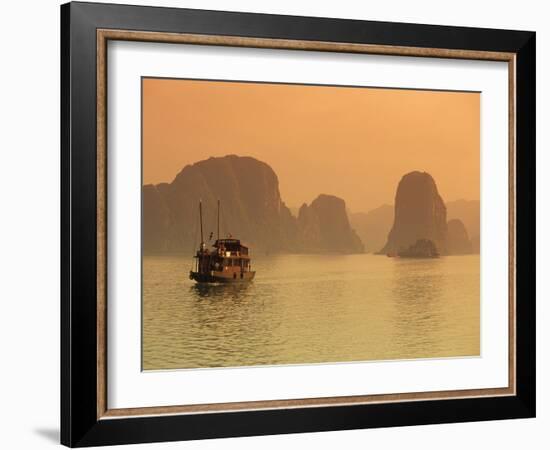 Traditional Boat Sailing Through Limestone Archipelago at Sunset, Ha Long Bay, UNESCO World Heritag-Stuart Black-Framed Photographic Print