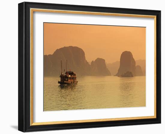 Traditional Boat Sailing Through Limestone Archipelago at Sunset, Ha Long Bay, UNESCO World Heritag-Stuart Black-Framed Photographic Print