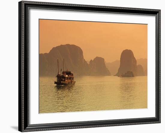 Traditional Boat Sailing Through Limestone Archipelago at Sunset, Ha Long Bay, UNESCO World Heritag-Stuart Black-Framed Photographic Print