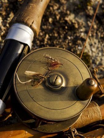 Traditional Brass Fishing Reel Fitted to a Split-Cane Fly Rod with