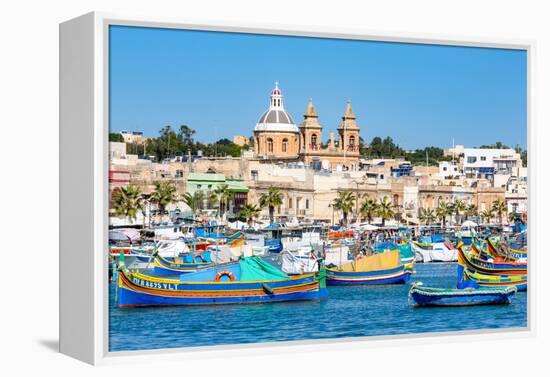 Traditional brightly painted fishing boats in the harbour at Marsaxlokk, Malta, Mediterranean, Euro-Martin Child-Framed Premier Image Canvas