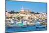 Traditional brightly painted fishing boats in the harbour at Marsaxlokk, Malta, Mediterranean, Euro-Martin Child-Mounted Photographic Print