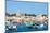 Traditional brightly painted fishing boats in the harbour at Marsaxlokk, Malta, Mediterranean, Euro-Martin Child-Mounted Photographic Print