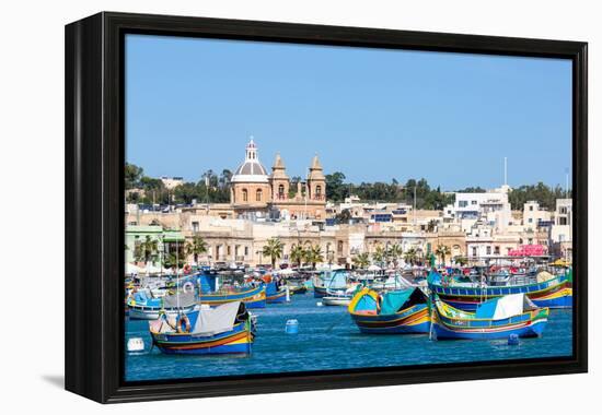 Traditional brightly painted fishing boats in the harbour at Marsaxlokk, Malta, Mediterranean, Euro-Martin Child-Framed Premier Image Canvas