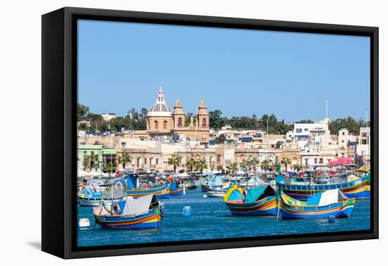 Traditional brightly painted fishing boats in the harbour at Marsaxlokk, Malta, Mediterranean, Euro-Martin Child-Framed Premier Image Canvas