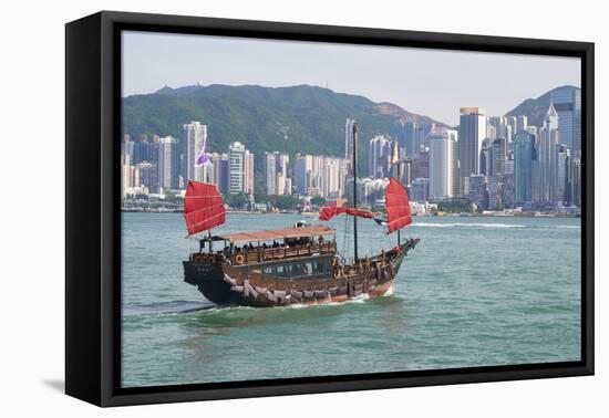 Traditional Chinese junk boat for tourists on Victoria Harbour, Hong Kong, China, Asia-Fraser Hall-Framed Premier Image Canvas