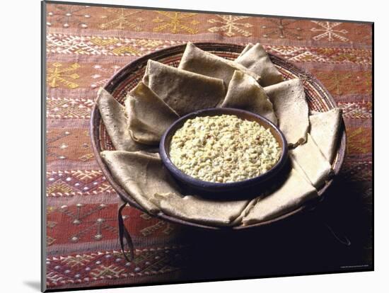 Traditional Ethiopian Breakfast of Wat, a Stew of Chick Peas and Injera, a Flat Sourdough Bread-John Dominis-Mounted Photographic Print