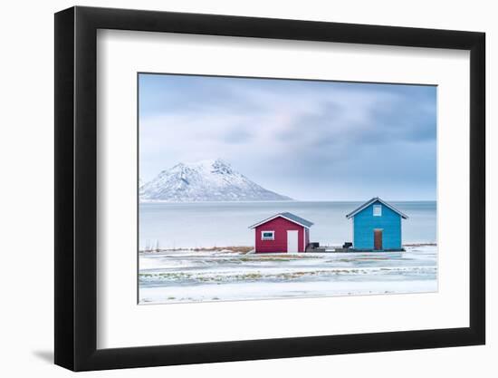 Traditional rorbu cabins overlooking the frozen sea, Troms county, Norway, Scandinavia, Europe-Roberto Moiola-Framed Photographic Print