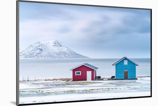 Traditional rorbu cabins overlooking the frozen sea, Troms county, Norway, Scandinavia, Europe-Roberto Moiola-Mounted Photographic Print