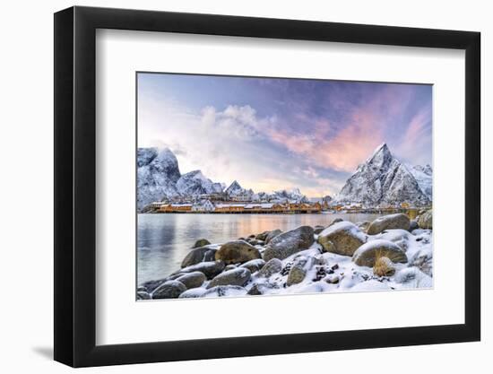 Traditional Rorbu in the fishing village of Sakrisoy at sunset in winter, Reine, Nordland county-Roberto Moiola-Framed Photographic Print