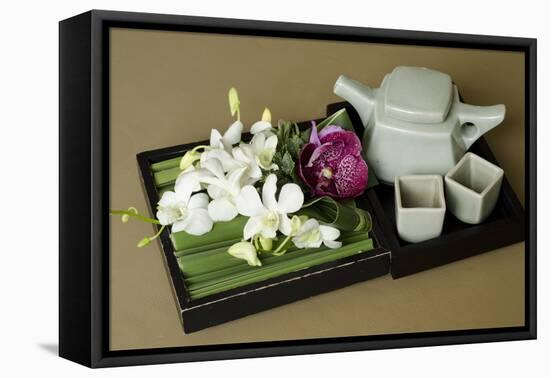 Traditional Thai Tea Pot and Cups with Orchid Arrangement, Bangkok, Thailand-Cindy Miller Hopkins-Framed Premier Image Canvas