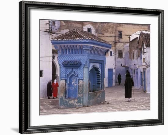 Traditionally Dressed Muslims in the Plaza Alhaouta, Morocco-Merrill Images-Framed Photographic Print