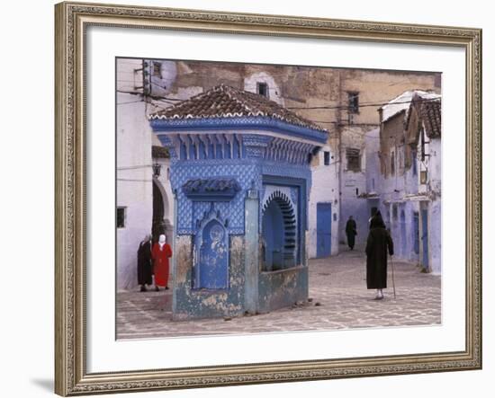 Traditionally Dressed Muslims in the Plaza Alhaouta, Morocco-Merrill Images-Framed Photographic Print