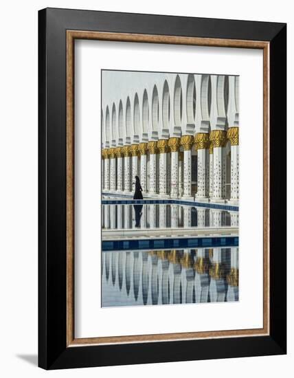 Traditionally Middle Eastern dressed woman walking in the Sheikh Zayed Mosque, Abu Dhabi, United Ar-Stefano Politi Markovina-Framed Photographic Print