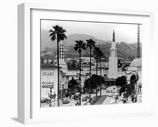 Traffic Along a Boulevard in the La Suburb of Westwood-Loomis Dean-Framed Photographic Print