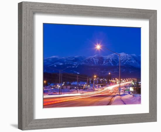 Traffic Flows into Town on Highway 93 at Dusk in Winter in Whitefish, Montana, Usa-Chuck Haney-Framed Photographic Print