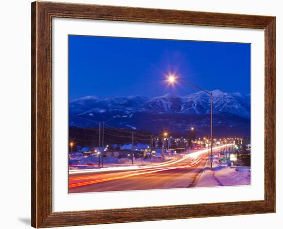 Traffic Flows into Town on Highway 93 at Dusk in Winter in Whitefish, Montana, Usa-Chuck Haney-Framed Photographic Print